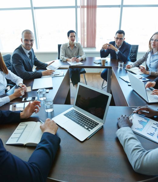 Business team discussing at board room